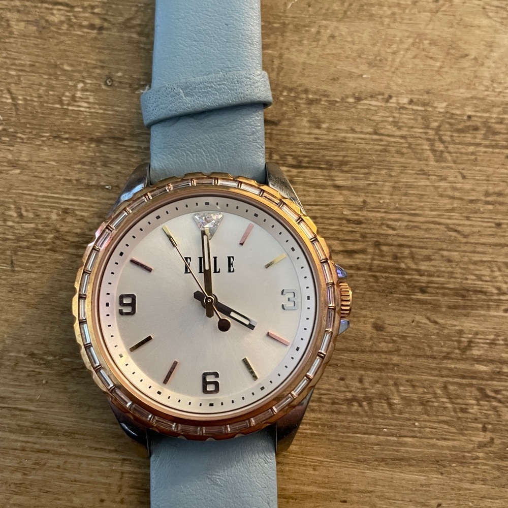 Elle Timepiece with Light Blue Band and Gold Bezel